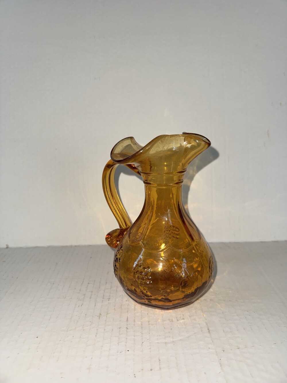 Vintage Amber Glass Mini Pitcher Grape Vine Pattern Ruffled Rim 6.5” - Picture 3 of 4
